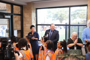 Superintendent Dr. Ken Gregorski and Boudny Elementarynamesakes greet students on the first day of school.