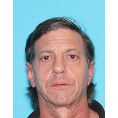 Official missing-person alert photograph of James Harrington