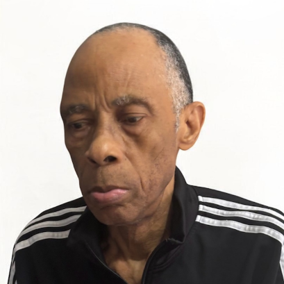 Official alert photograph of Alexander Ngoke